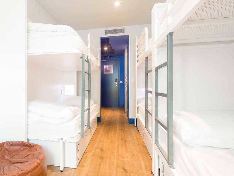 Cama en habitación compartida de 6 camas