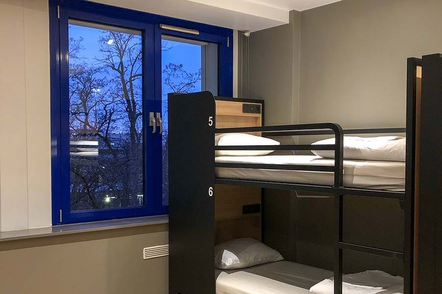 Bed in 14-bed Dorm – Shared Bathrooms